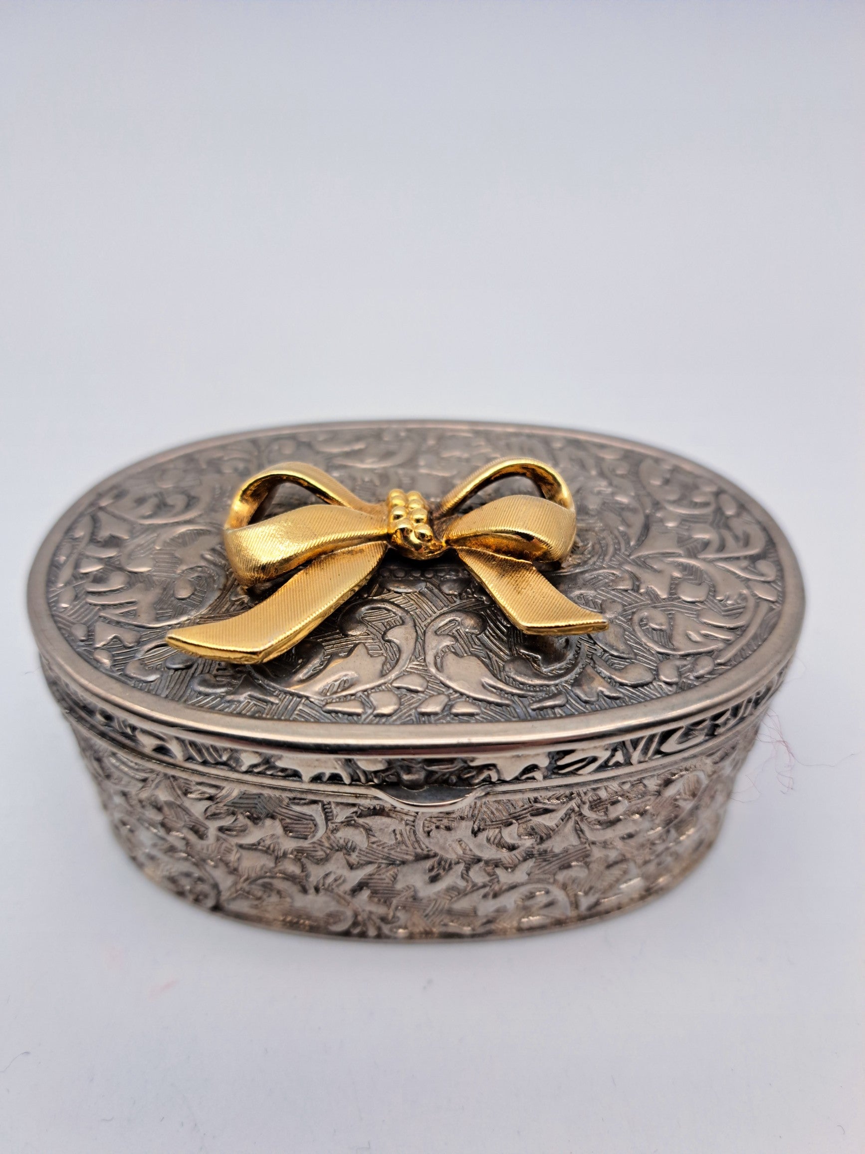 Vintage Silver Plated Oval Trinket Box with Gold Tone Bow Accent