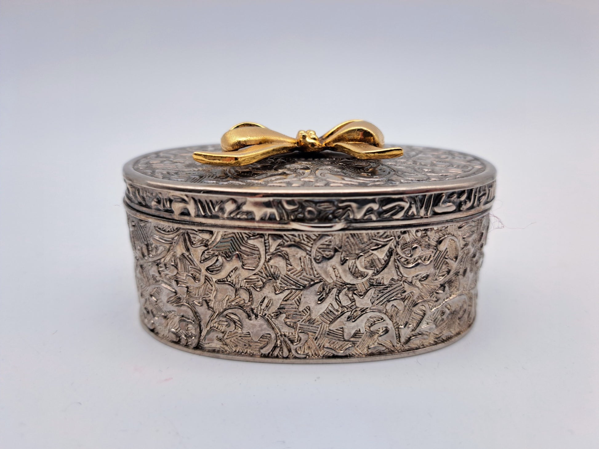 Vintage Silver Plated Oval Trinket Box with Gold Tone Bow Accent