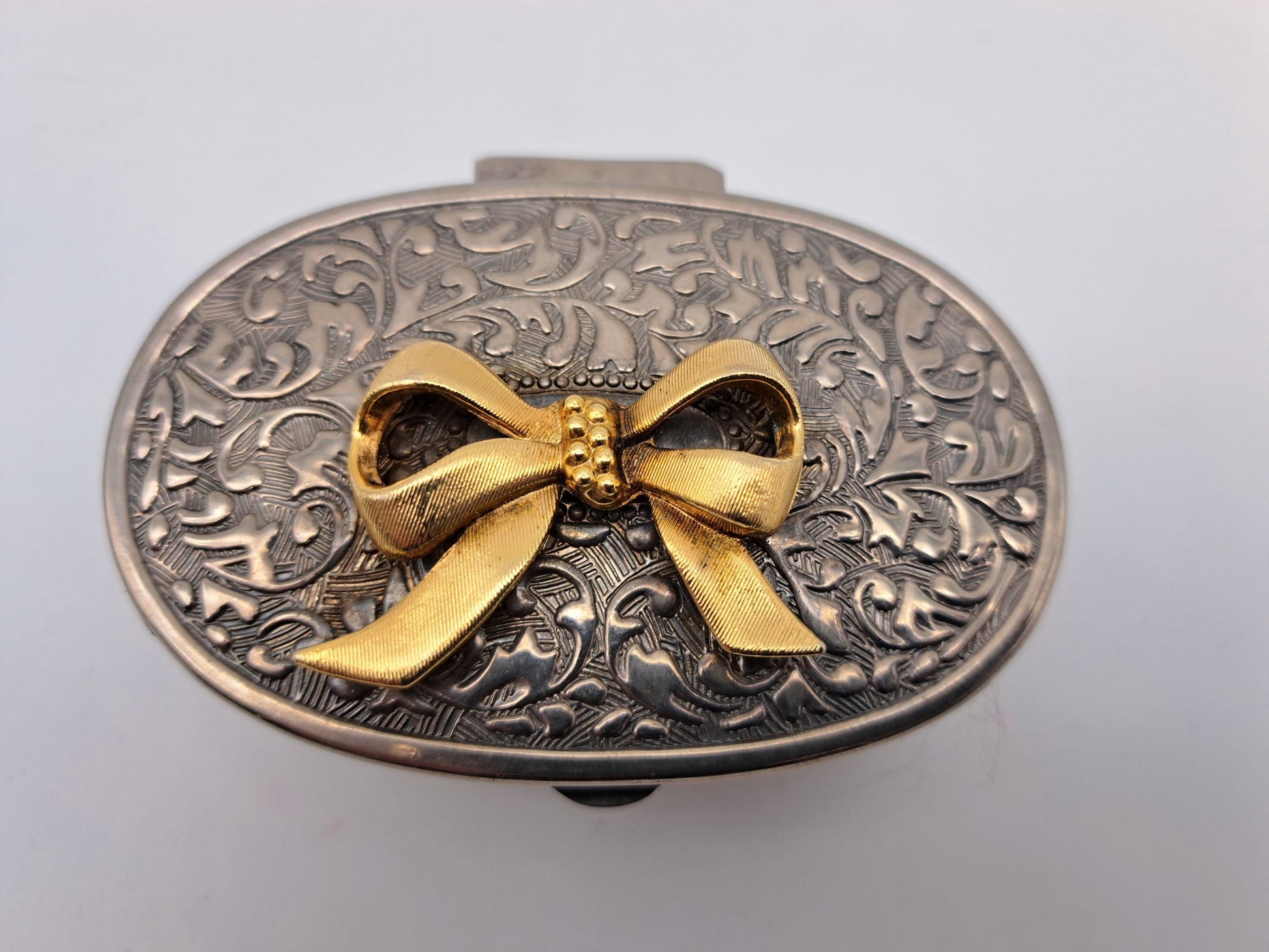 Vintage Silver Plated Oval Trinket Box with Gold Tone Bow Accent