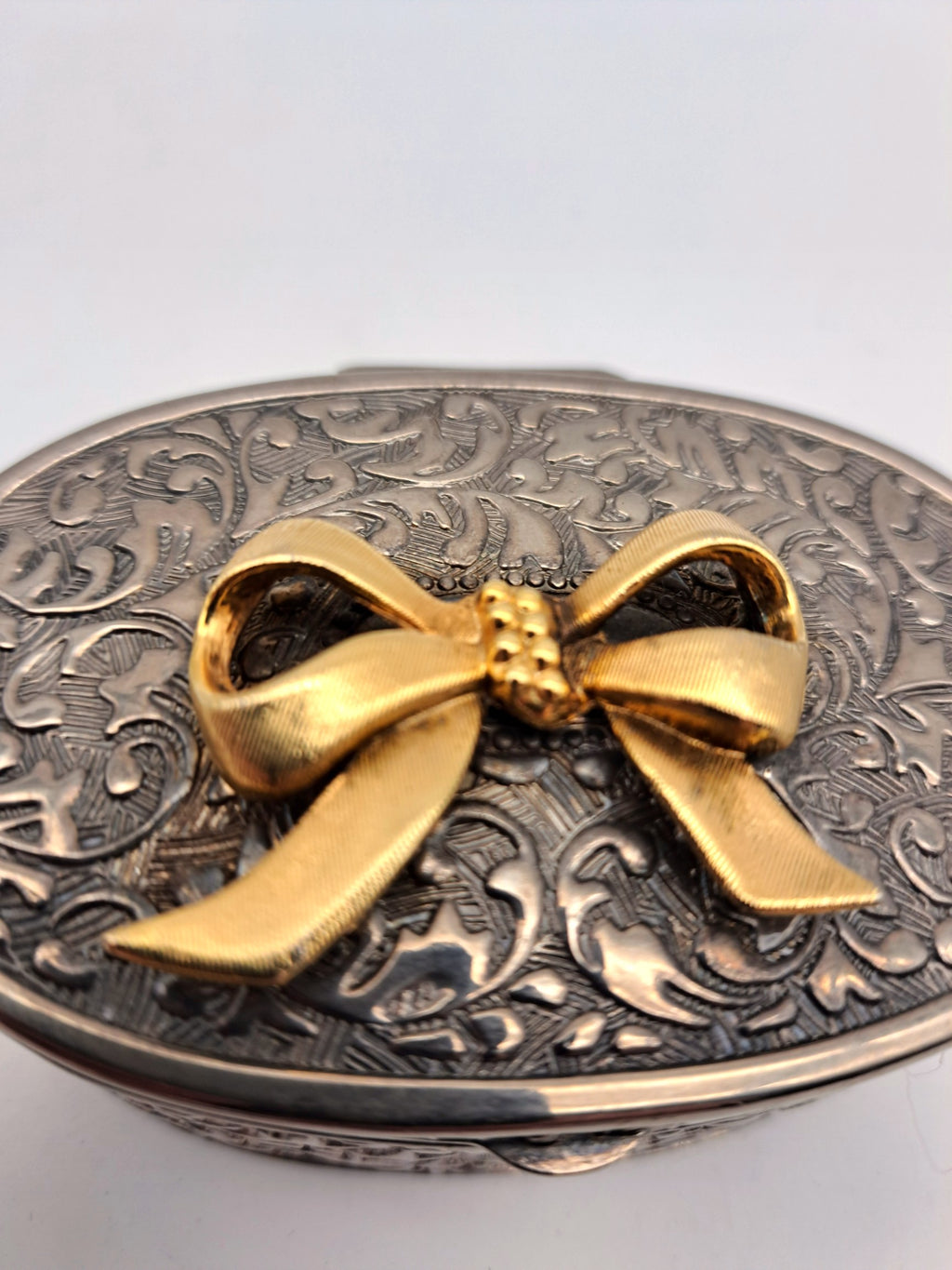 Vintage Silver Plated Oval Trinket Box with Gold Tone Bow Accent