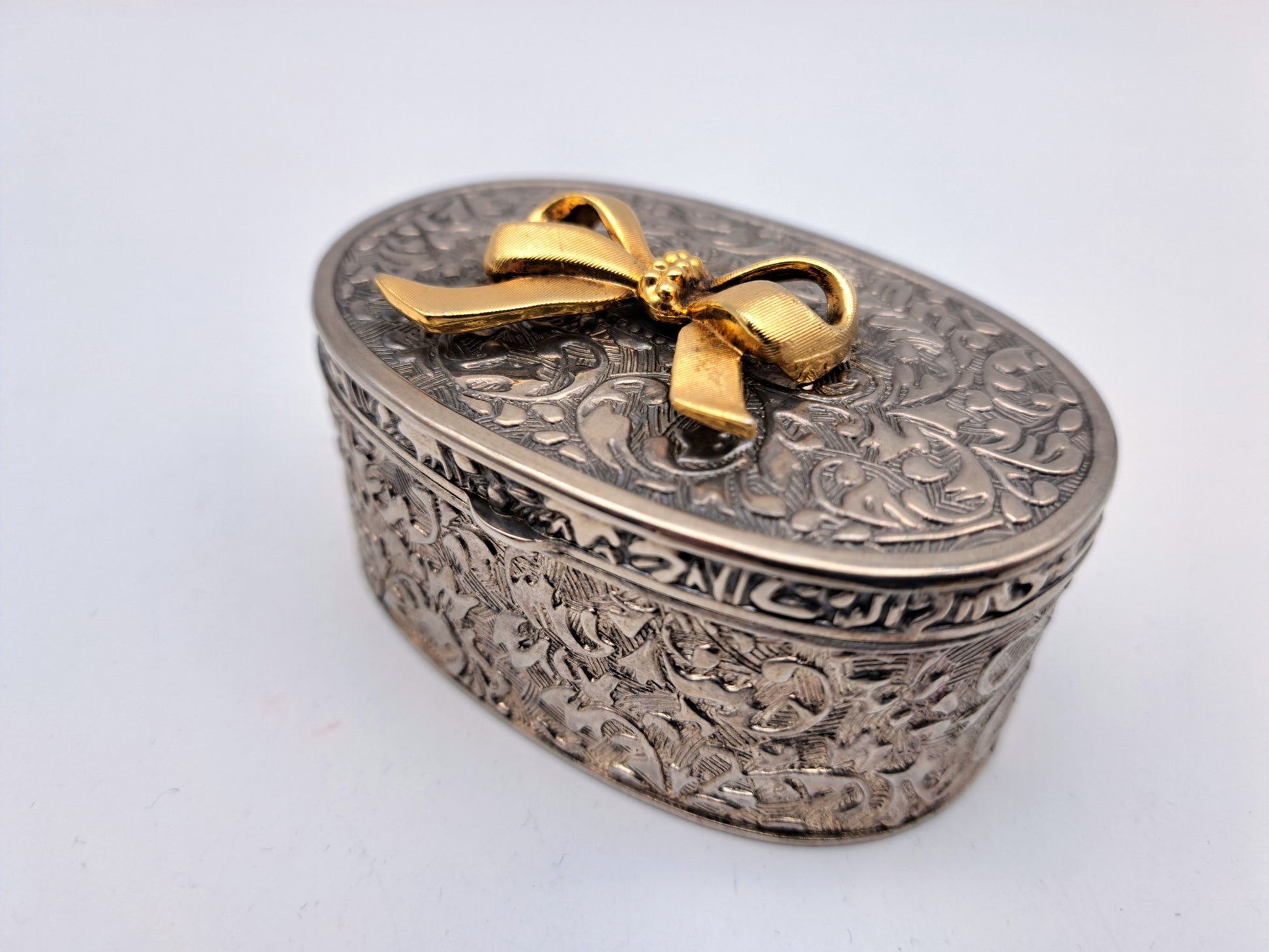 Vintage Silver Plated Oval Trinket Box with Gold Tone Bow Accent