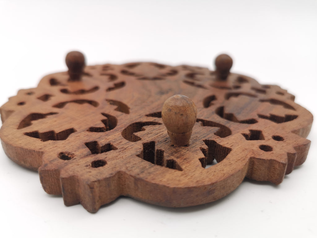 Vintage Indian Hand-Carved Wood Trivet with Bone Inlay.