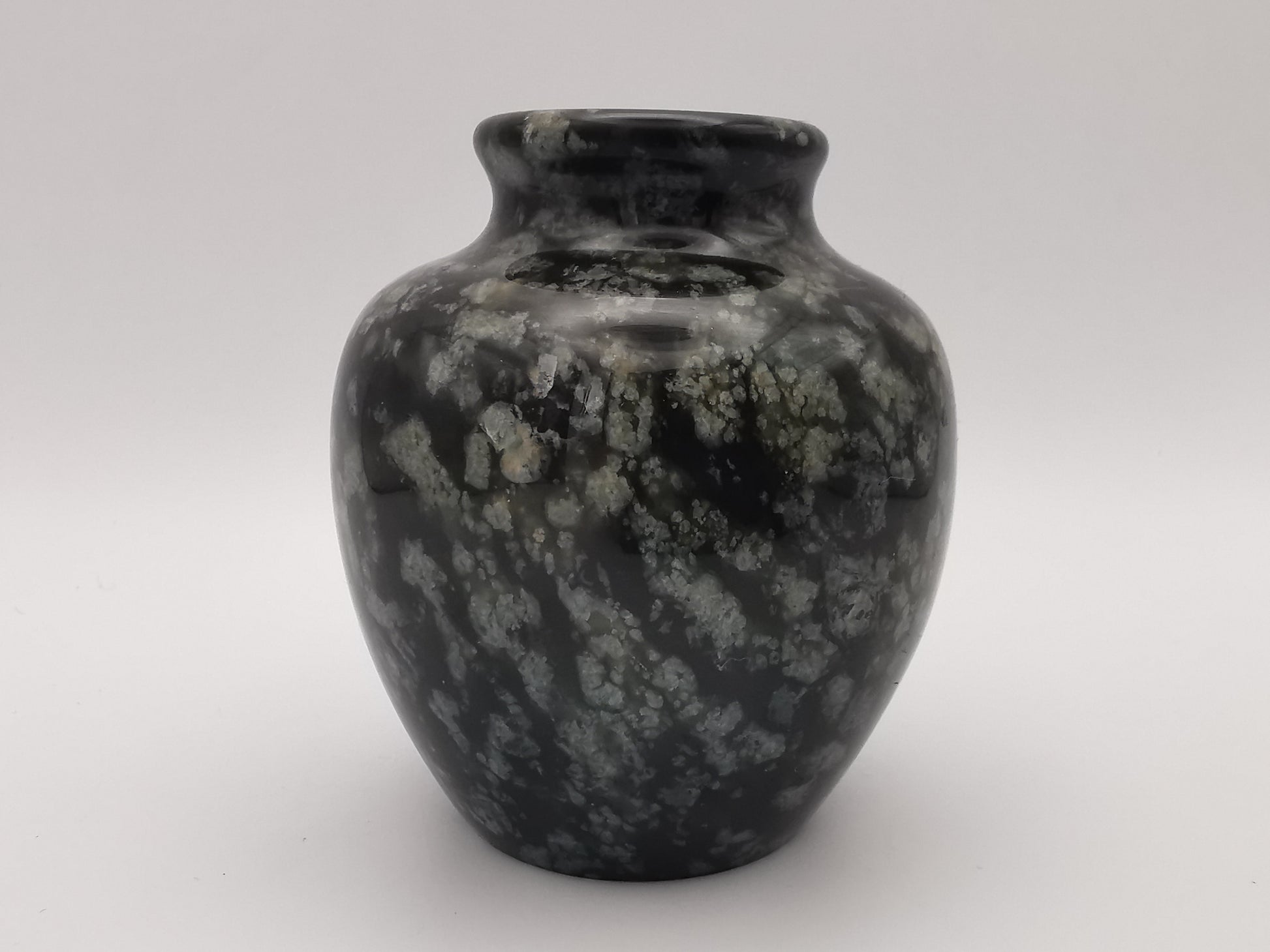 Small black speckled stone/marble vase