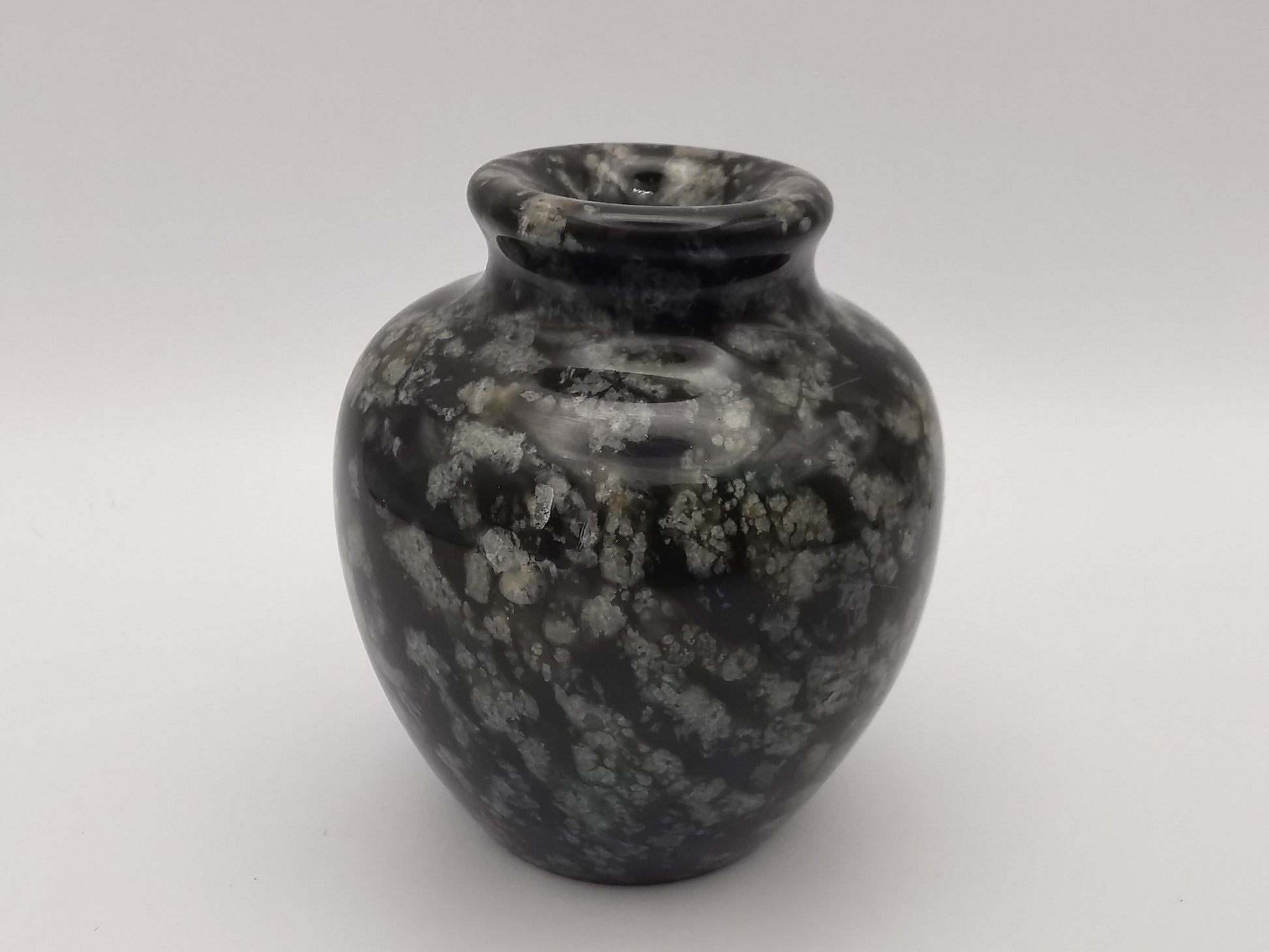 Small black speckled stone/marble vase