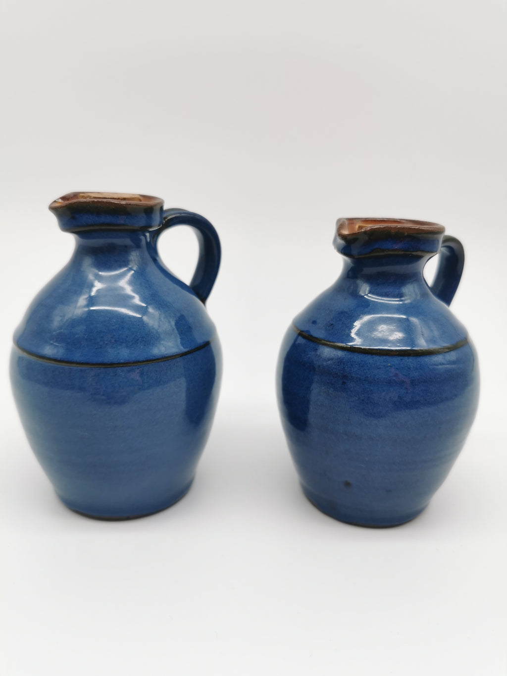 Denby pottery pair of blue jugs pots