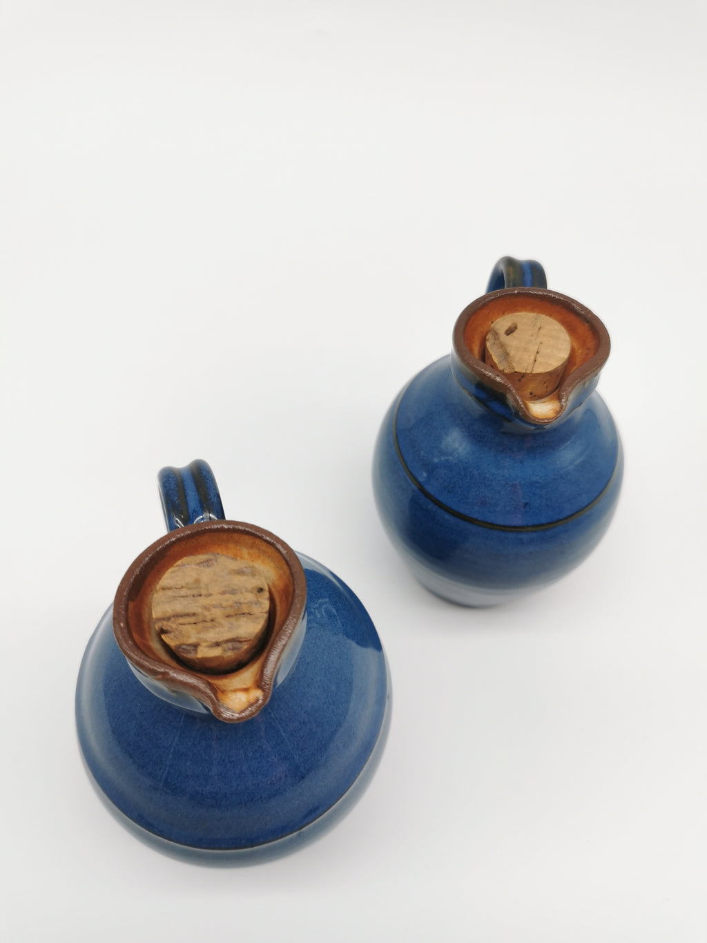 Denby pottery pair of blue jugs pots