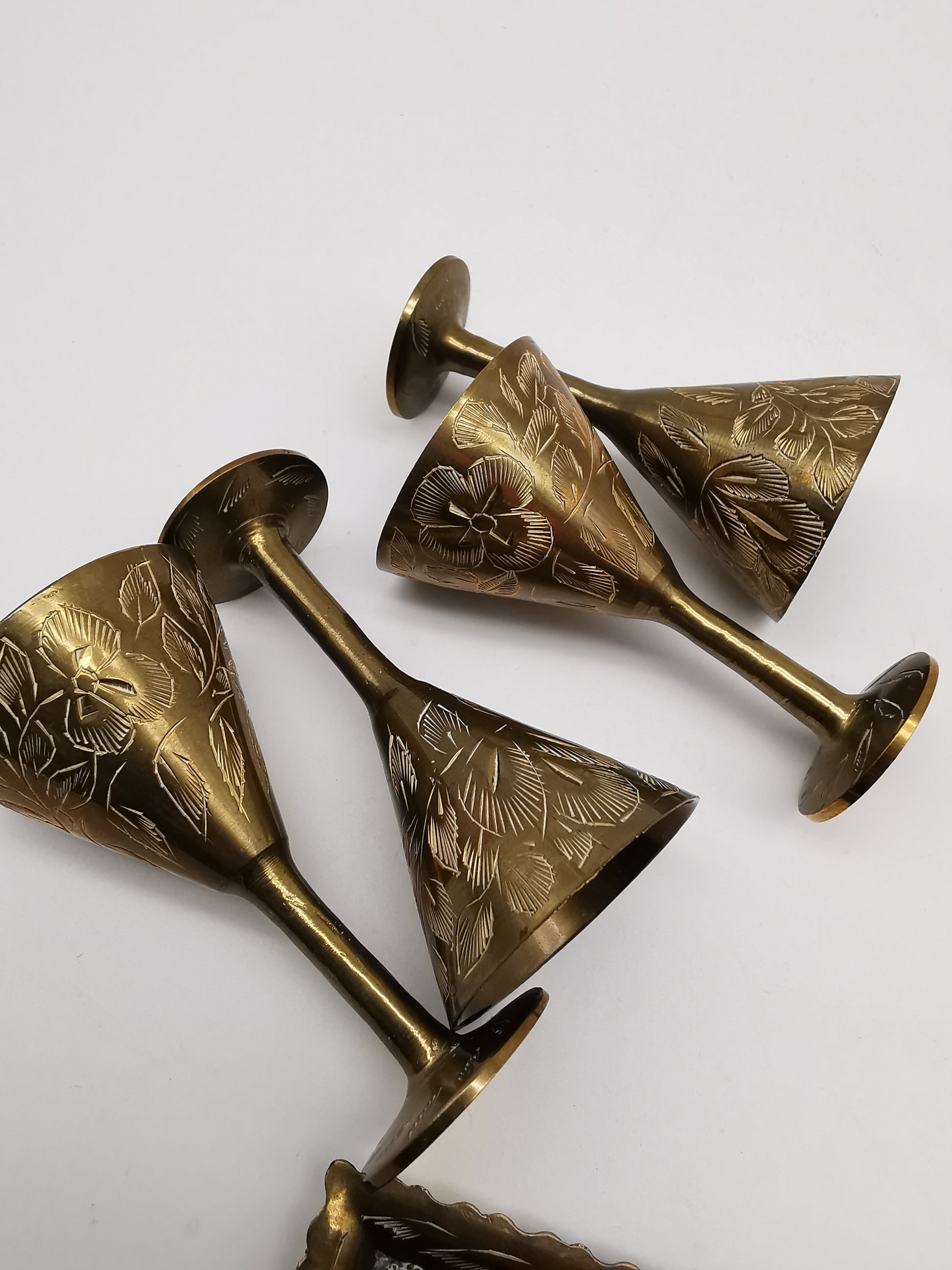 Vintage Indian Etched Brass Shot Glasses Set – 4 Mini Goblets with Matching Square Tray